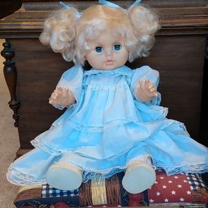 Blonde doll blue dress